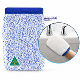 A blue and white microfiber cleaning Mitt shown on a white background, with a circular inset demonstrating a hand wearing the mitt near a sink. A small logo at the bottom left reads Australian Made, and partial text at the top right appears to read TheGroutDok.