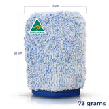 A blue and white microfiber cleaning cloth with a blue fabric base, shown with dimension lines indicating 17 cm width, 22 cm height, and 73 grams weight. An Australian Made logo is visible on the front.