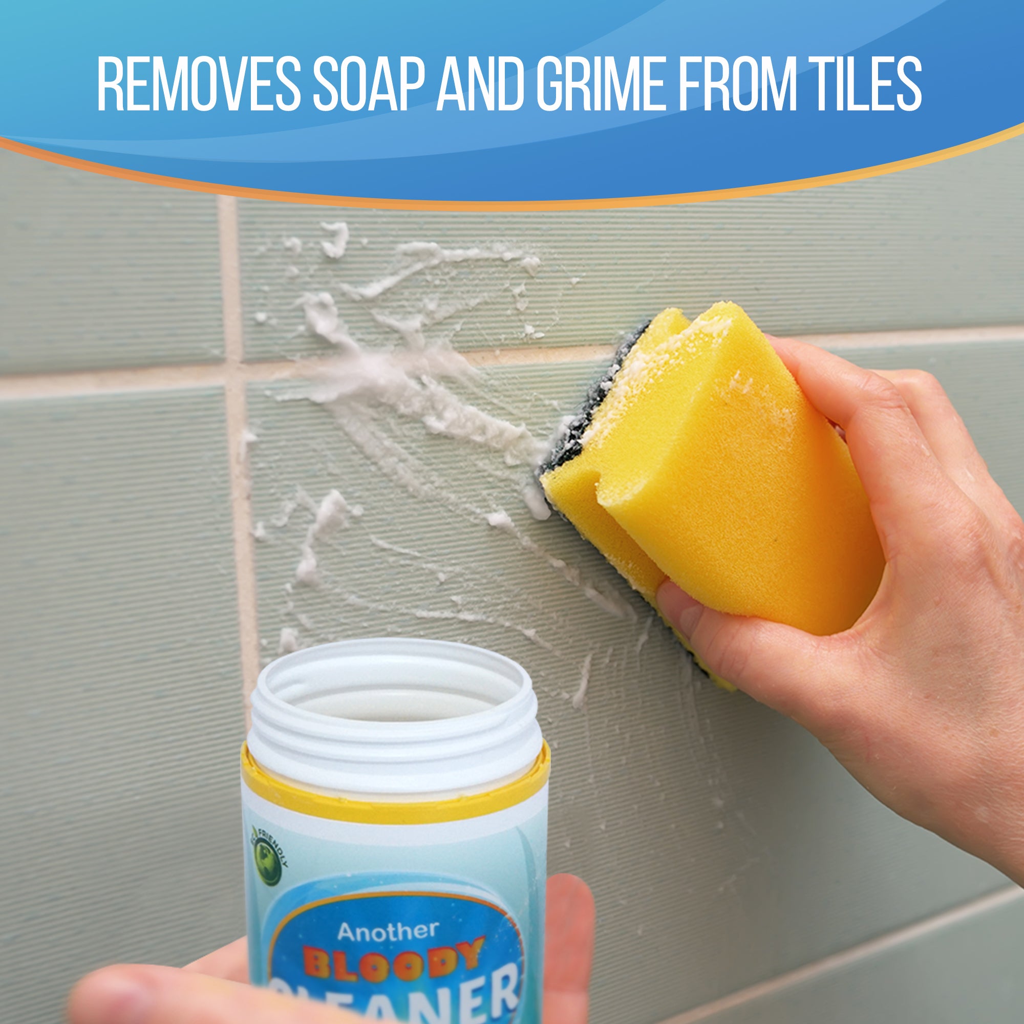 A hand holds a yellow sponge against a tiled wall while applying a cleaning paste from a small white jar labeled 'Another Bloody Cleaner.' Text at the top reads 'Removes Soap and Grime from Tiles.