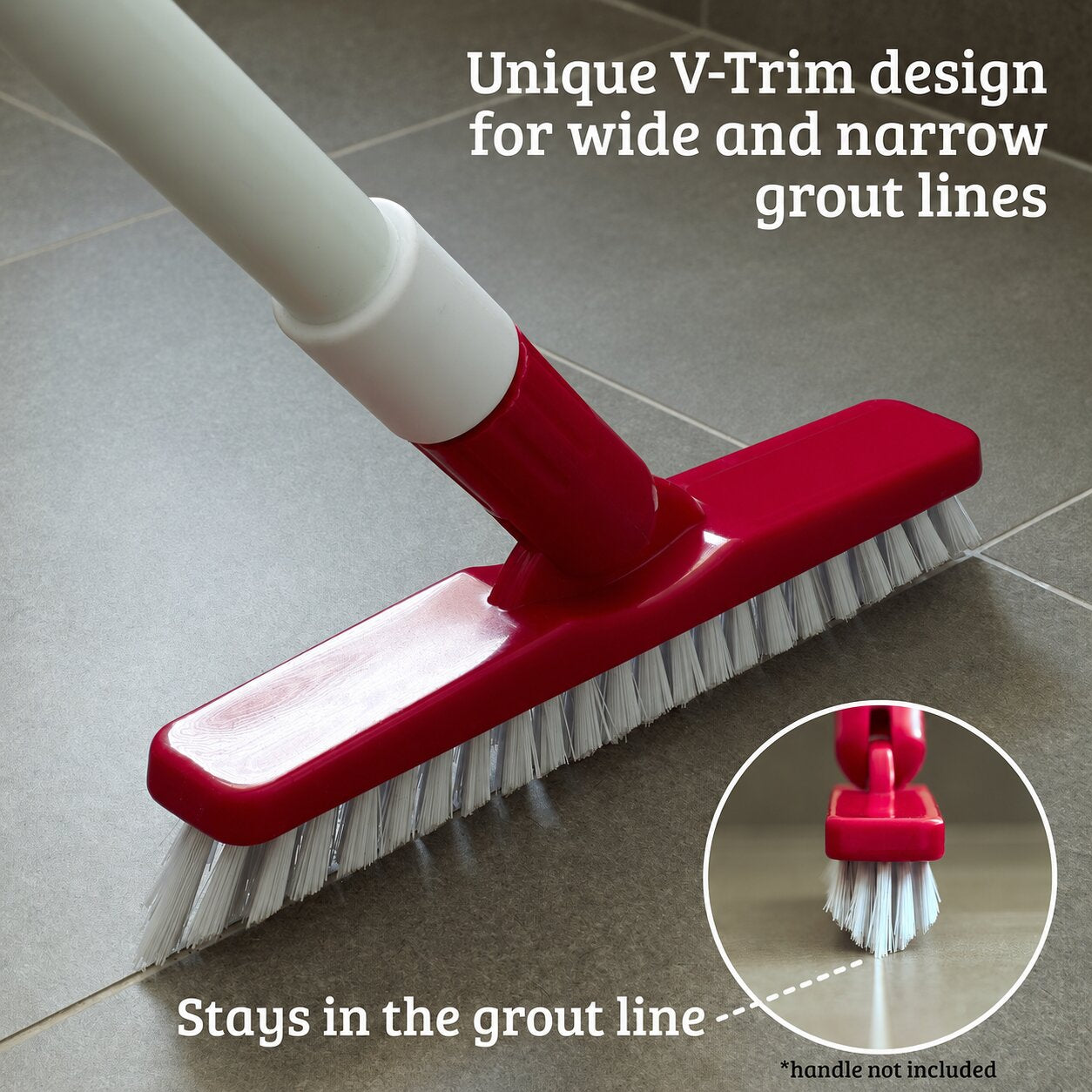 A red and white floor cleaning brush with white bristles shown on gray tile flooring, with text reading 'Unique V-Trim design for wide and narrow grout lines' and a circular inset showing the brush head detail.